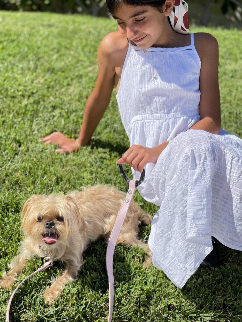 A young person sharing a quiet moment with a dog