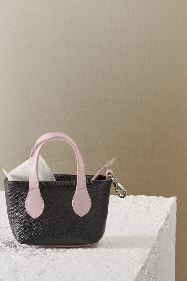 Pink poop bag holder by Shaya Pets. Hand crafted in Italy.